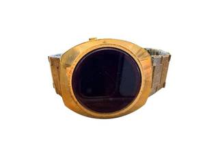 lot 14 image: Vintage Digital Watch with Gold-Tone Bezel and Stainless Steel Back