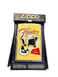 lot 93 image: Fender 1954 Catalog Zippo Lighter with Display Case