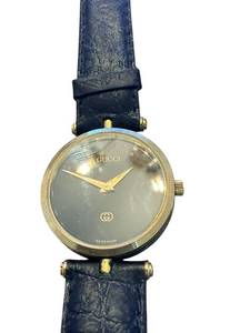 lot 122 image: Gucci Swiss Made Black and Gold Wristwatch with Leather Band