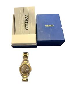 lot 134 image: Seiko Solar Stainless Steel and Gold Tone Analog Watch with Box