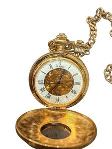 lot 163 image: Stauer Gold Tone Pocket Watch with Chain and Engraved Cover