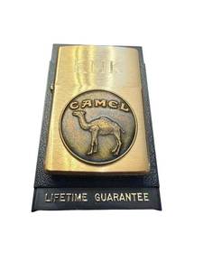 lot 184 image: 1992 Zippo Brass Camel Lighter with KMK Monogram