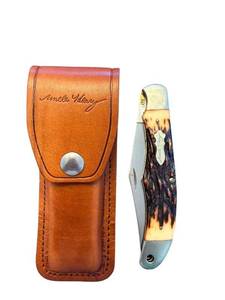 lot 274 image: Uncle Henry Model 127UH Folding Pocket Knife with Sheath