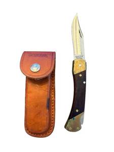 lot 277 image: Schrade USA 127UH Uncle Henry Folding Pocket Knife with Sheath