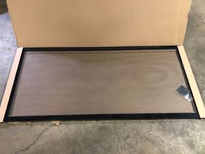 lot 54 image: Andersen 35-18 in. x 77-916 in. 200 Series Black Perma-Shield Gliding Patio Door Aluminum Insect Screen customer return see pictures