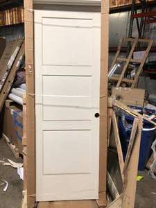 lot 59 image: Jeld Wen 30 in x 80 in Panel Birkdale Primed smooth hollow core molded composite interior door slab customer return see pictures