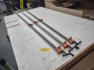 lot 320 image: (3) Pipe Clamps, 106...