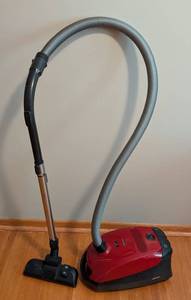 lot 108 image: ML - Miele Classic C1 Canister Vacuum with Attachments and Extra Bags