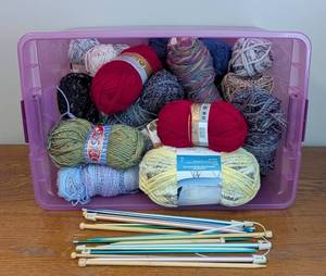 lot 111 image: ML - Assorted Yarn and Knitting Needle Collection in Storage Bin
