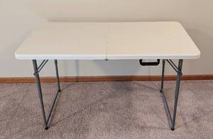 lot 122 image: LL - PDG 4ft x 24in Folding Table with Carry Handle