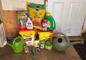 lot 150R image: G - Large Garden Care Lot with Watering Cans, Weed Preventer, Plant Food, Tools, Kneeler and More