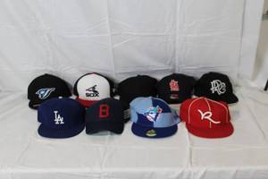 lot 23 image: Collection of 9 Assorted Baseball Caps Including Team Logos