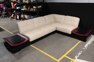 lot C-127 image: Modern Sectional Cream Leather Sofa with Wood Accent Tables