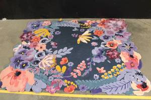 lot 137 image: Anthropologie Wool and Rayon Floral Area Rug 5x8 Irregular Edge
