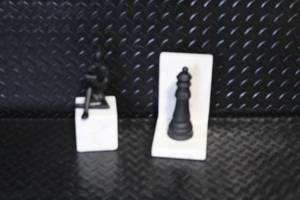 lot 172 image: Set of 2 Marble Bookends with Chess and Figure Design