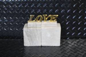 lot 177 image: Pair of Marble and Brass LOVE Bookends