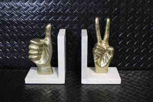 lot 180 image: Set of 2 Marble Bookends with Gold Hand Gestures