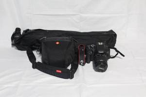 lot B-201 image: Canon EOS Rebel T6i DSLR Camera Kit with 18-55mm Lens, Bag, and Tripod