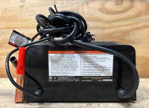 lot 23 image: Cen-Tech 12V Analog Battery Charger With Engine Starter