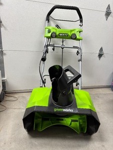 lot 52 image: Excellent Condition Greenworks 20 13 amp Corded Electric Snow Thrower (extension cord not included)