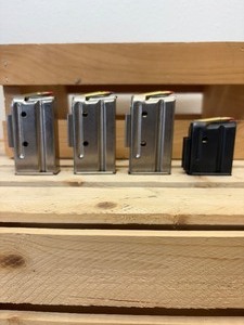 lot 68 image: 4 Pc Lot (3) Mariln 7 Round filled & (1) Marlin 4 Round filled Magazines for .22 WMR and .17 HMR Caliber Rifles for Winchester Magnum Rimfire and Hornady Magnum Rimfire