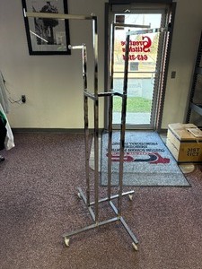 lot 78 image: Wheeled 4 Arm Clothing Rack
