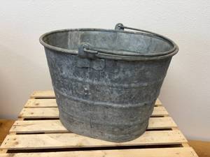 lot 63 image: Early 1900s 14 L x 11W X 10 T Galvanized Bucket w Handle and 4 attachment points on the Bottom