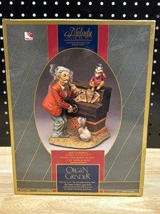 lot 23 image: Melody in Motion - Organ Grinder