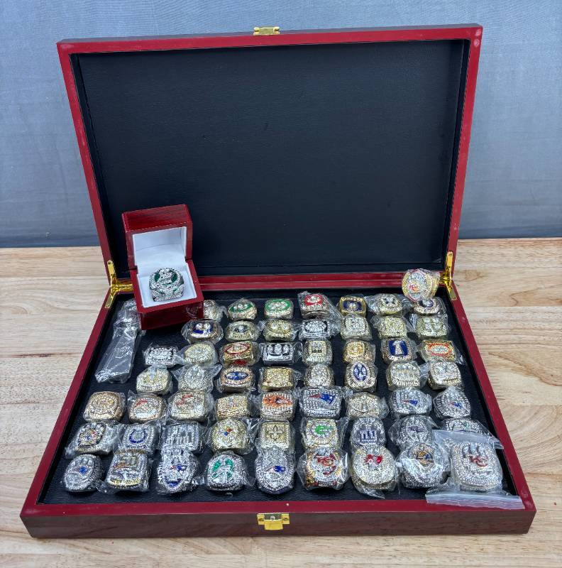 lot 2E image: NFL Football Super Bowl Championship Ring Set - 59 Rings in Beautiful Display Case with Lombardi Trophy Packers Chiefs Raiders Patriots 49ers Brady Favre Namath Montana Mahomes Eagles - Brand New I