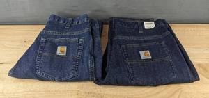 lot 160M image: Carhartt Womens Jeans Size 4 Reg (New) and 4 Tall Z