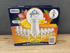 lot 113T image: Glade PlugIns Scented Oil Kit in Hawaiian Breeze, 1 Warmer  9 Refills - Brand New