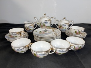 lot 66 image: Vintage Japanese Porcelain Tea Set with Hand-Painted Landscape Design