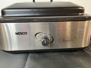 lot 97 image: Nesco 18-Quart Roaster Oven with Removable Rack and Manual