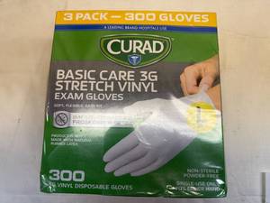 lot 48 image: Curad Size L Basic Care 3G Stretch Vinyl
