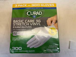 lot 51 image: Curad Size L Basic Care 3G Stretch Vinyl