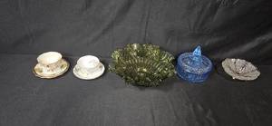 lot 48 image: Vintage Tea Cups with Saucers, Green Glass Bowl, Blue Covered Candy Dish, and Footed Clear Glass Bowl Collection