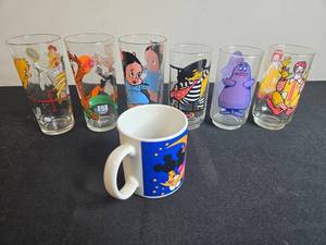 lot 107 image: Vintage McDonalds Collector Glasses and 1985 Disney Mug Lot