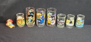 lot 125 image: Collection of Vintage Cartoon Character Drinking Glasses and Looney Tunes Welchs Jelly Jars
