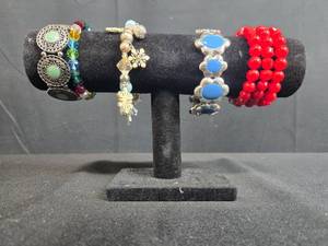 lot 212 image: Set of Costume Jewelry Stretch Bracelets Assorted Colors and Styles - display not inc