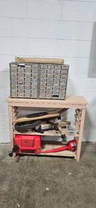 lot 228 image: Workbench Lot with Metal Drawer Organizers, Wheels, Red Fuel Can, and Hardware