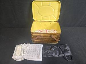 lot 236 image: Vintage Metal Heating Pad Set with Tin Case