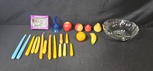 lot 260 image: Mixed Decor Lot with Glass Bowl, Blue Glass Bell, Candles, Faux Fruit, and Slim Taper Candle Holder Set