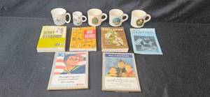 lot 329 image: Vintage Boy Scouts of America Books, Plaques, and Camping Mugs Collection
