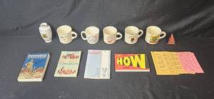 lot 330 image: Vintage Boy Scout Memorabilia Lot with Mugs, Handbooks, Songbook, and More
