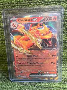 lot 12 image: Pokmon 151 Charzard EX