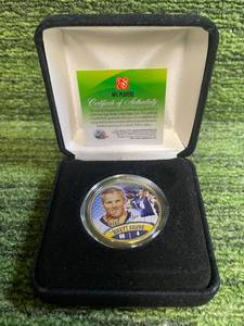 lot 91 image: Brett Favre Commemorative Coin with certificate