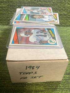 lot 169 image: 1984 Topps Football Set #1-396 Sharp Set