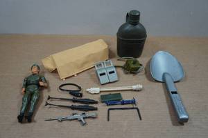 lot 110 image: Rambo Action Figure and GI Joe Accessories