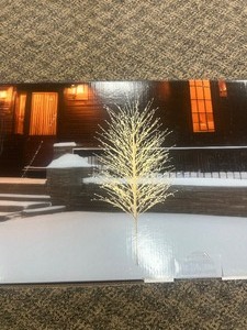 lot 7 image: Christmas Twinkle Tree With Lights - MSRP $150