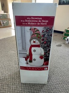 lot 12 image: 49 in Plush Snowman - MSRP $150